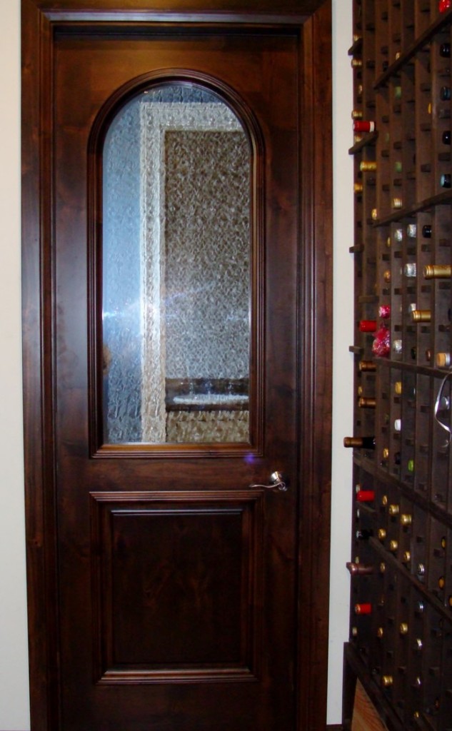 The door was custom designed specifically for this wine cellar