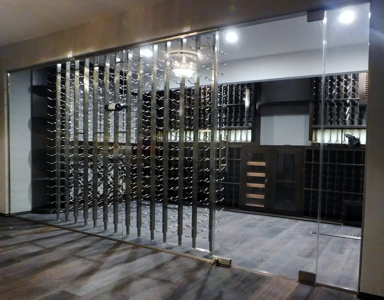 This design idea is now a 2,055 bottle wine cellar tasting and cigar room 1300p