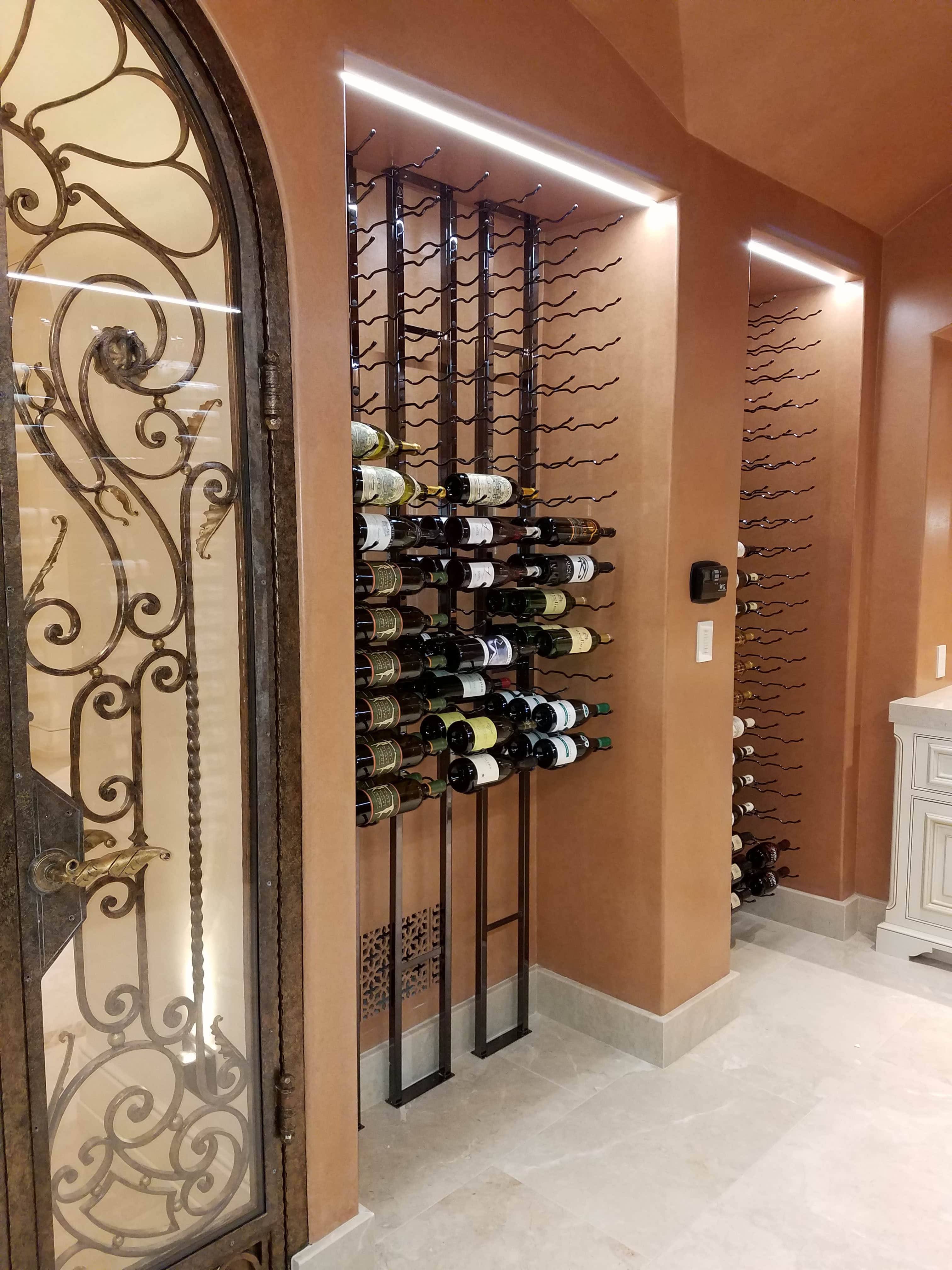 A Stunning Floor to Ceiling Metal Wine Rack Display in Irvine California Coastal Custom Wine
