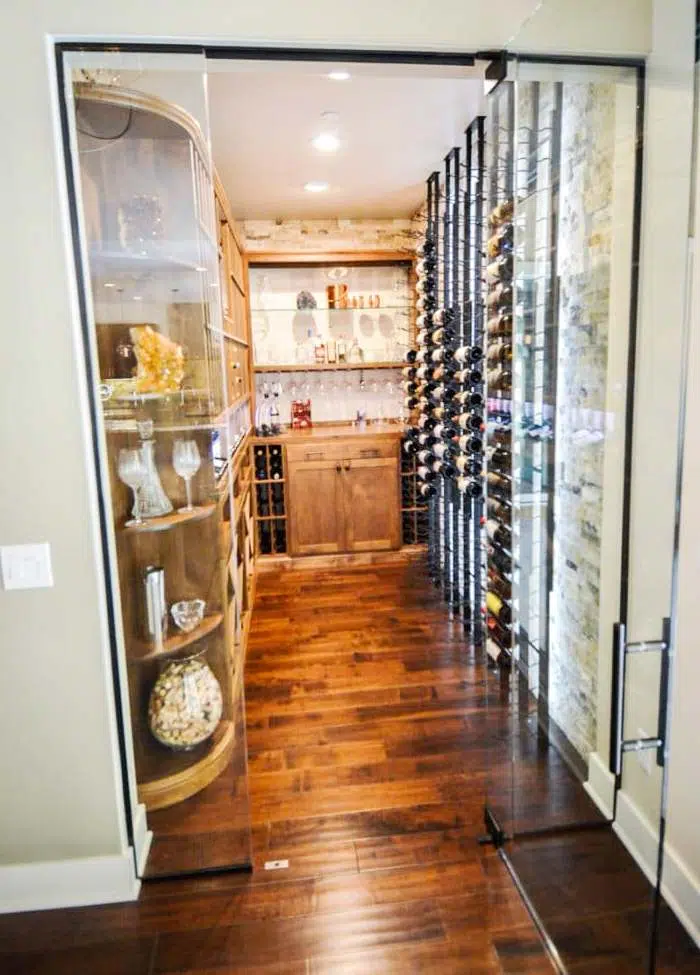 Custom Wine Cellar with Flooring from Reclaimed Barrels