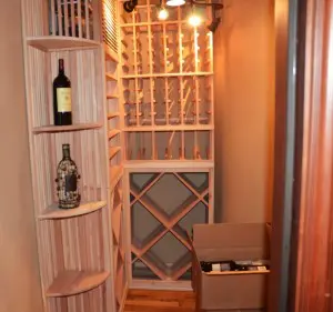 A Small Space was Converted into an Elegant Custom Home Wine Cellar with Wood Wine Racks
