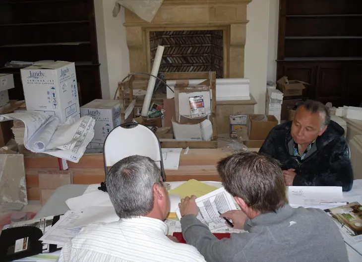 Experts Creating a Luxurious Wine Cellar Design After a Thorough Assessment of the Client's Needs