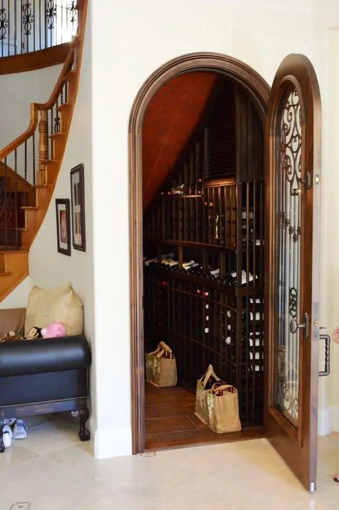 Need help with your wine cellar door design? Click here to request a free custom design. Elegant Custom Wine Cellar Door by Coastal Custom Wine Cellars