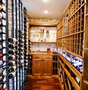 Elegant Metal and Wood Wine Racks Designed for a Custom Home Wine Cellar