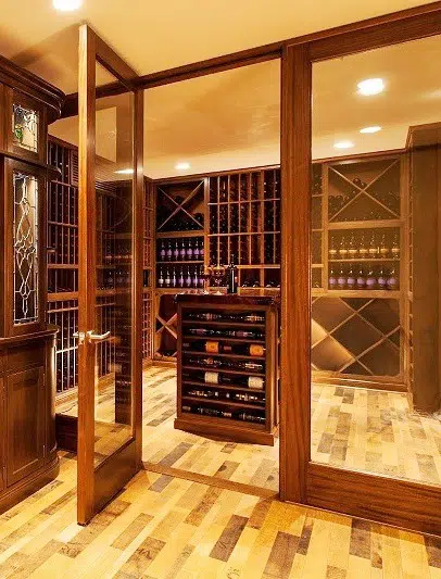 Custom Wine Cellar and Tasting Room with Wine-Barrel Flooring