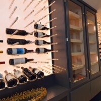 Form meets functionality is this stunning home custom wine cellar.