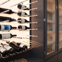 This wine storage was designed and built by Coastal Custom Wine Cellars. We're excited to work with you to create the wine cellar of your dreams!
