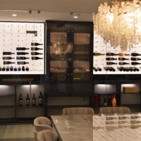 Glass walls and doors make your collection easy to see. This custom wine cellar is an amazing conversation piece!