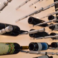 Polished stainless steel looks incredible set against this backlit panel.