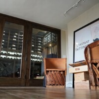 The style of this residential glass wine cellar matches the tastefully designed home perfectly.