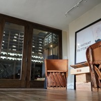 The style of this residential glass wine cellar matches the tastefully designed home perfectly.