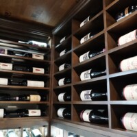 Label-forward wooden racking is a beautiful and practical way to store bottles of all different sizes.