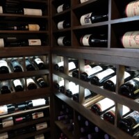 LED lights show off the gorgeous bottles in this custom display row.