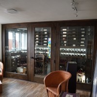 Glass wine cellars like this one are a very popular and stylish addition to California homes.