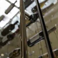 Chrome door handles are another beautiful and modern touch to contemporary glass wine cellars.