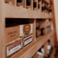 This traditional home wine cellar in San Diego also includes cigar storage.