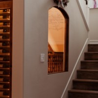 Many homeowners have available space under their stairs. It's a perfect place to build a wine cellar.
