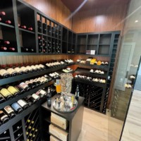 Transitional wine cellars include both modern and traditional elements.