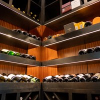 Adjustable LED lighting allows you to enhance the mood and style in your custom home wine cellar.