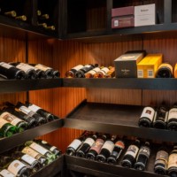 These display rows can hold bottles in multiple sizes and even boxes.