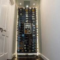 Where would you add a small modern wine cellar like this one in your home?
