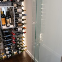 Label forward metal peg racking makes these wine labels easy to read.