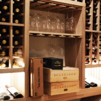 For convenience, we allocated a special space within our custom-made wooden wine racks where the owners could place their wine glasses. This area can also be used for decanting wines, handling the tools, and more!