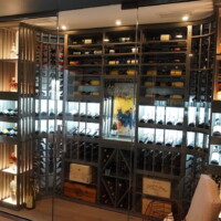 This wooden wine racking is 100% customized. We collaborated with the client as to what his preferences are and what his plans are for his wine collection before coming up with this design. At Coastal Custom Wine Cellars, we're here to help make your wine cellar dreams come true.