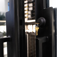 Our custom glass wine cellar door handles are designed for easy gripping. Part of the section is padded and you can see some of the seams if you zoom in.