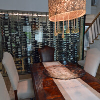 More than the look, our custom wine rack and cellar ideas are geared to stimulate unique experiences. Imagine having a pleasant get together around this dining table with the view of this beautiful wine cellar!