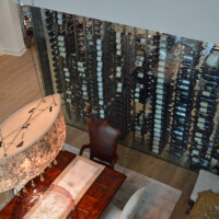 This is the view of our custom wine racks from the staircase. The idea was to make the entire rack floor to ceiling so it also serves as a wall.