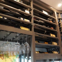 Of course, we didn't forget a stemware section within our wooden wine racking. The owners didn't have to worry about walking to the kitchen to get some wine glasses every time because every tool is stored together with the wine collection!