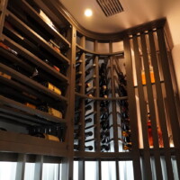 The register you see on the ceiling (above the wooden wine racking) is one of two air passages for the wine cooling system.