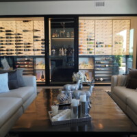 We opted to build only one door for the entire modern wine room. The glass door came with a black, brushed aluminum door handle.