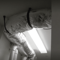 This duct is where the wine cellar's air supply travels. Custom Wine Cellar Cooling System