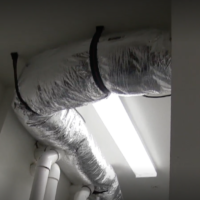 This duct is where the wine cellar's air supply travels. Custom Wine Cellar Cooling System