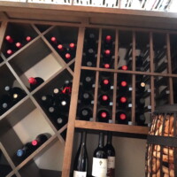Lattice diamond bins, small cubbies, and standard 750 ml storage were some of our racking configurations in this wine cellar. Refrigerated Wine Cellar Racking Styles