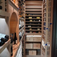 Everything you see in this home wine room was custom-designed. From the flooring to the racks, and ceiling, everything was planned solely for this project. Design Ideas for Custom Home Wine Rooms