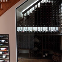 This refrigerated wine cellar's custom racking was set against a light wall which we formally call and acrylic LED panel. Refrigerated Custom Wine Cellar Racks