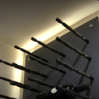 We used backer boards so we could run LED ribbon lights behind them. What do you think about the resulting glow? Home Wine Cellar Lighting Backdrop