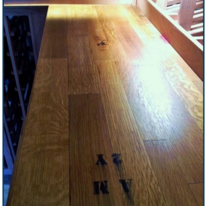 An authentic cooperage countertop where you can still find markings from the original oak barrel.